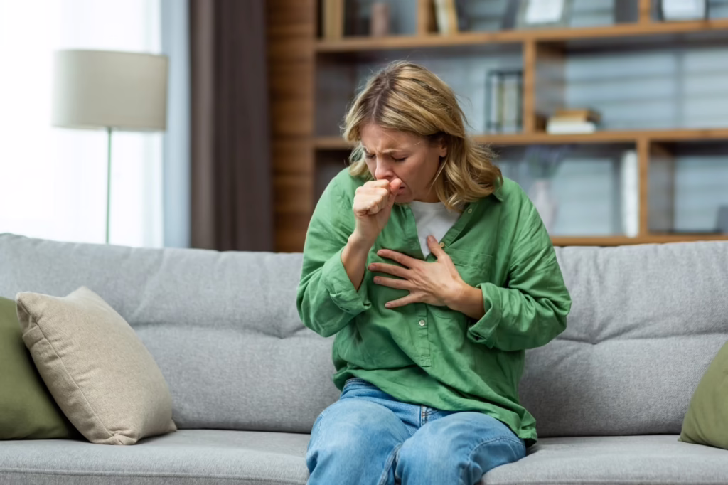 woman with symptoms who may qualify for a whooping cough research study